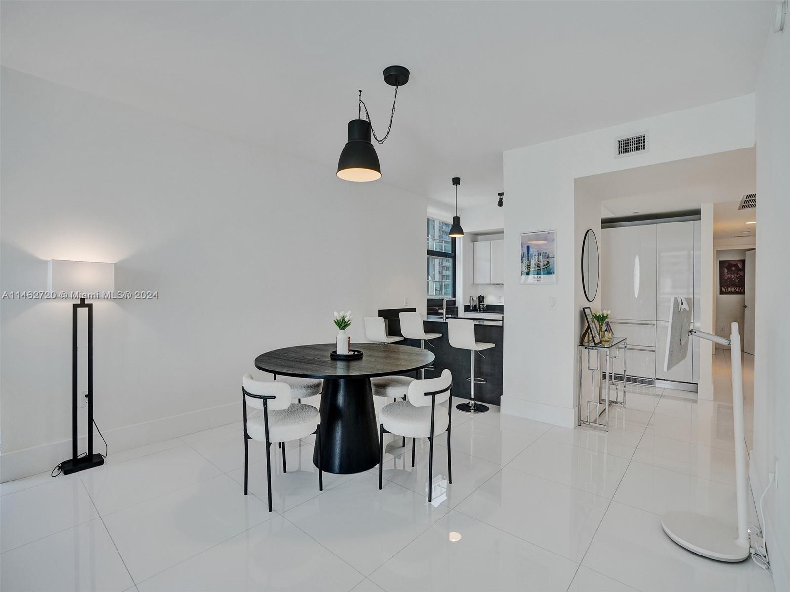 1010 Brickell Avenue, Unit 2505 Miami, FL 33131 - Photo 13 of 61 a view of a workspace with furniture