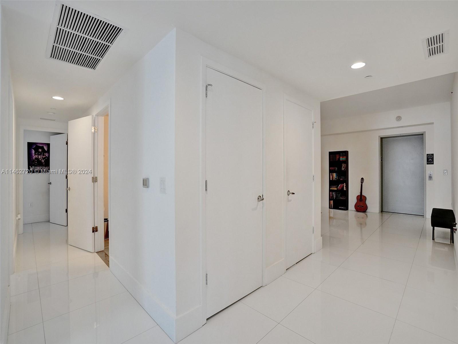 1010 Brickell Avenue, Unit 2505 Miami, FL 33131 - Photo 2 of 61 a view of hallway with a hallway