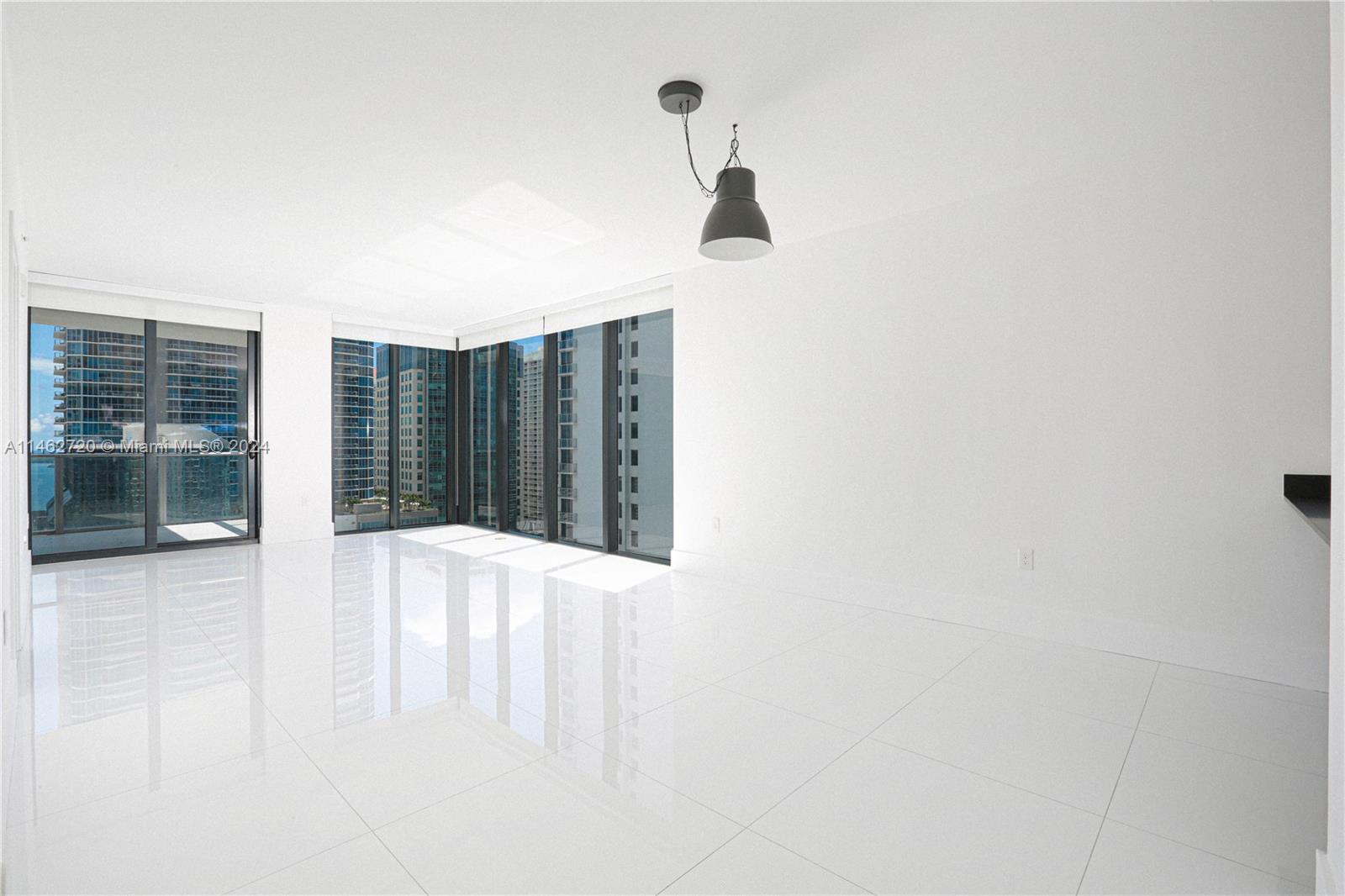 1010 Brickell Avenue, Unit 2505 Miami, FL 33131 - Photo 56 of 61 a view of an empty room with a window
