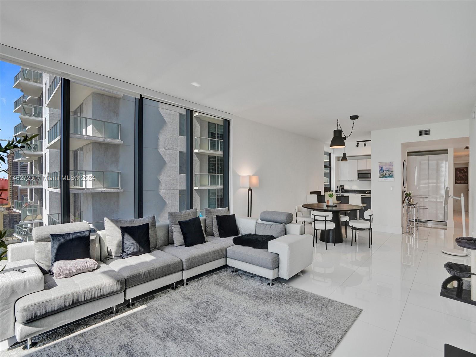 1010 Brickell Avenue, Unit 2505 Miami, FL 33131 - Photo 8 of 61 a living room with furniture and a table