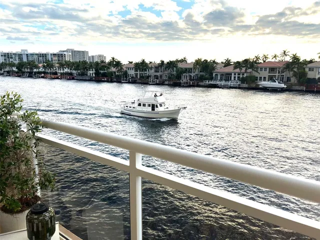 a view of a lake from a balcony