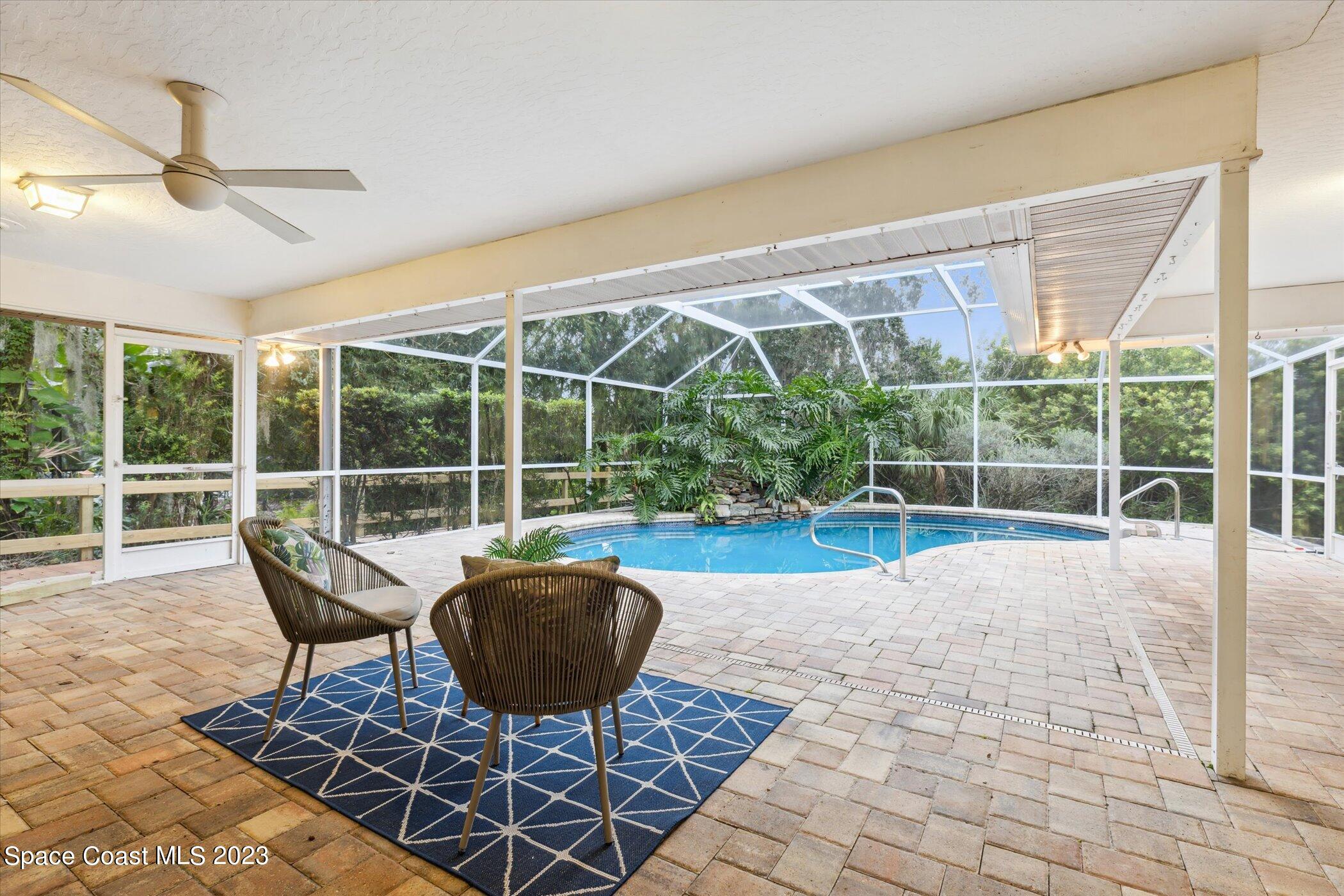 4644 Canard Road Melbourne, FL 32934 - Photo 3 of 42 a view of a porch with furniture and garden