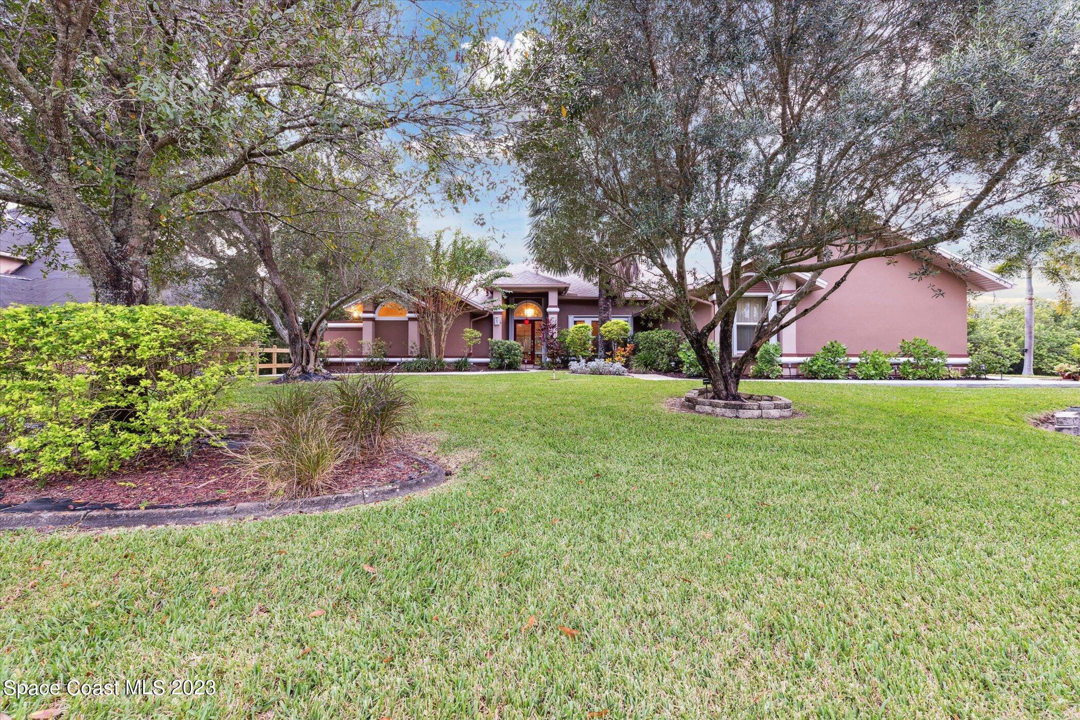 4644 Canard Road Melbourne, FL 32934 - Photo 42 of 42 a view of yard with tree s