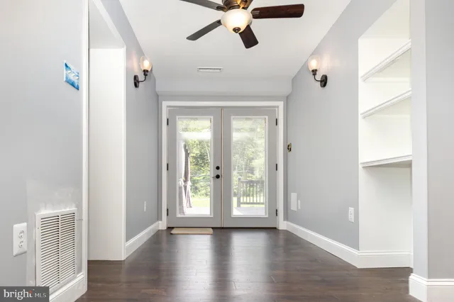 a view of storage and utility area with lots of clutter