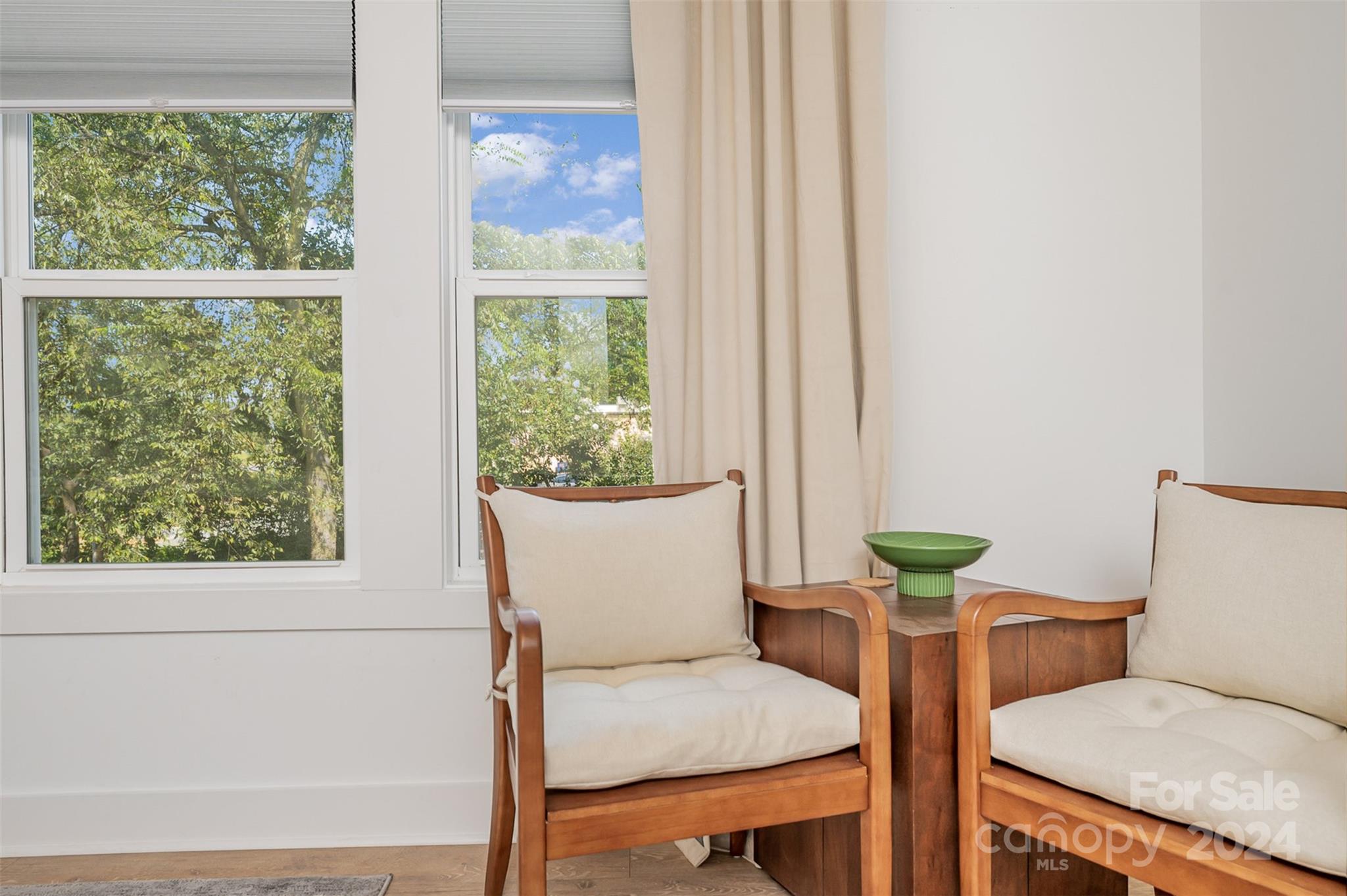 643 Tennyson Drive Charlotte, NC 28208 - Photo 14 of 42 a living room with furniture and a window