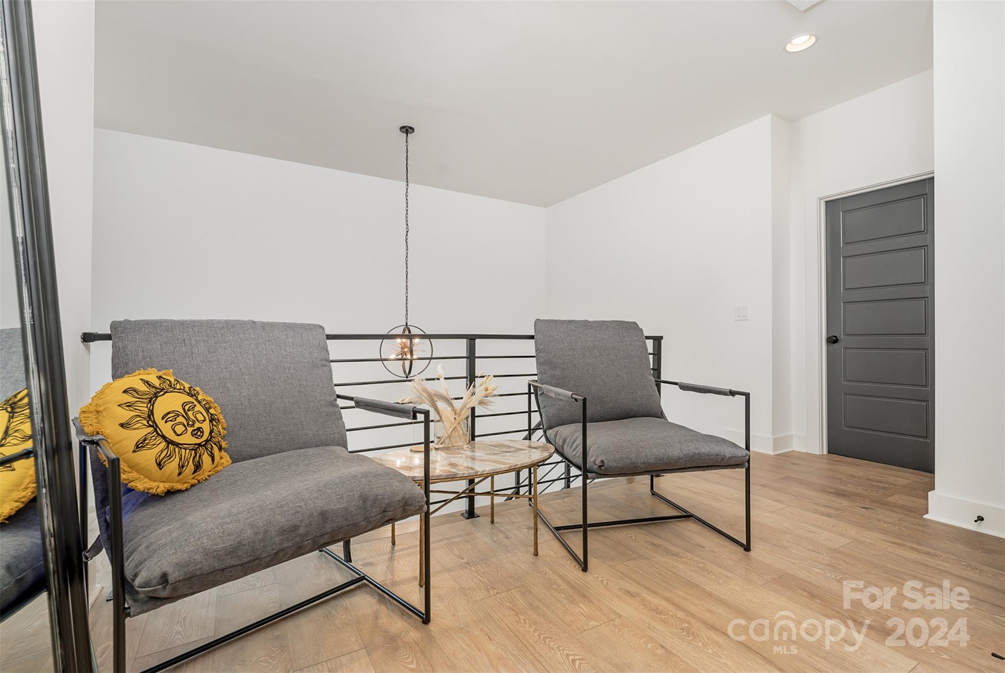 643 Tennyson Drive Charlotte, NC 28208 - Photo 17 of 42 a living room with furniture and a rug