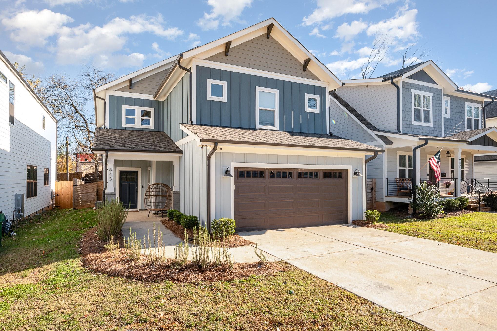 643 Tennyson Drive Charlotte, NC 28208 - Photo 2 of 42 a front view of a house with a yard