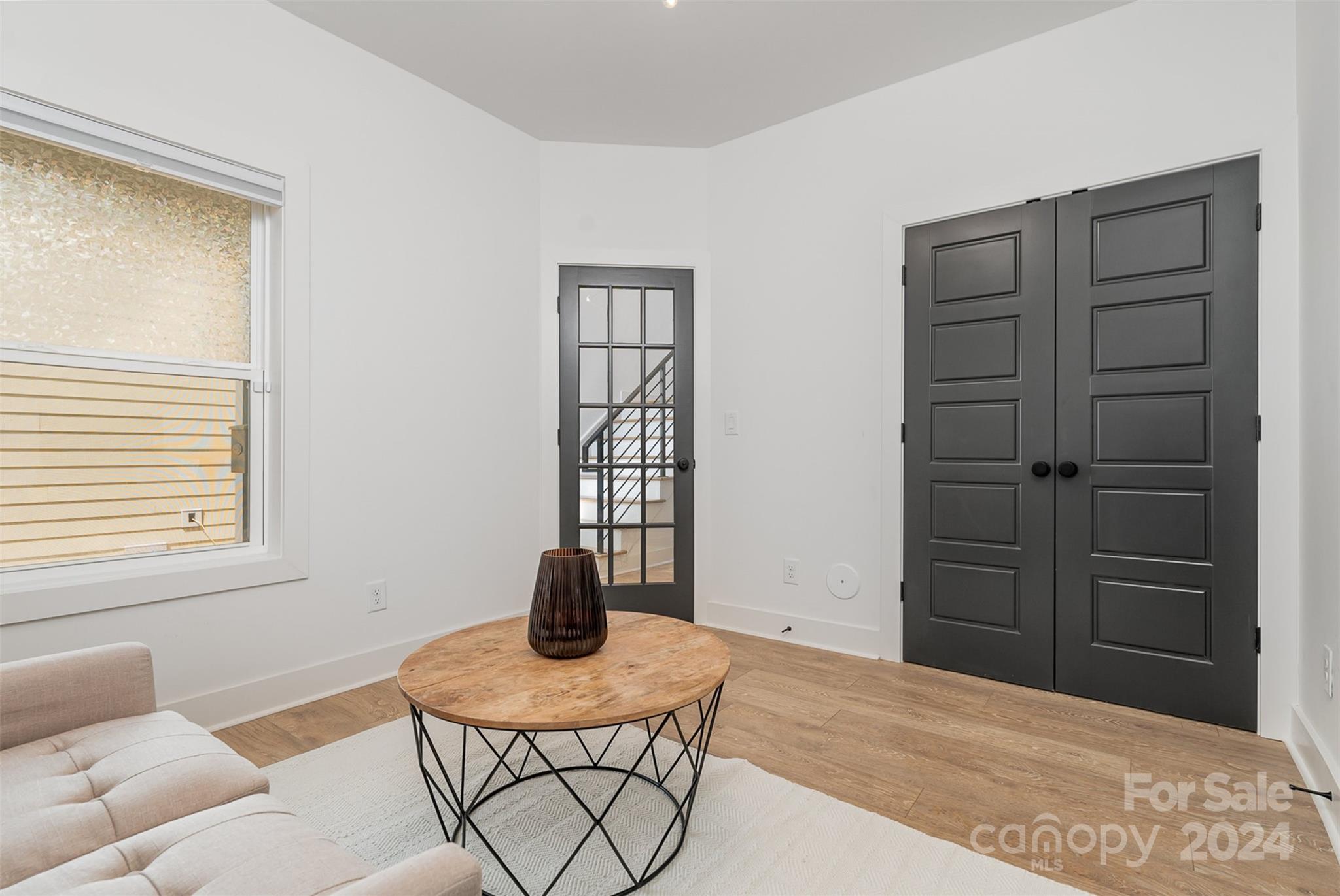 643 Tennyson Drive Charlotte, NC 28208 - Photo 24 of 42 a bedroom with a bed and furniture