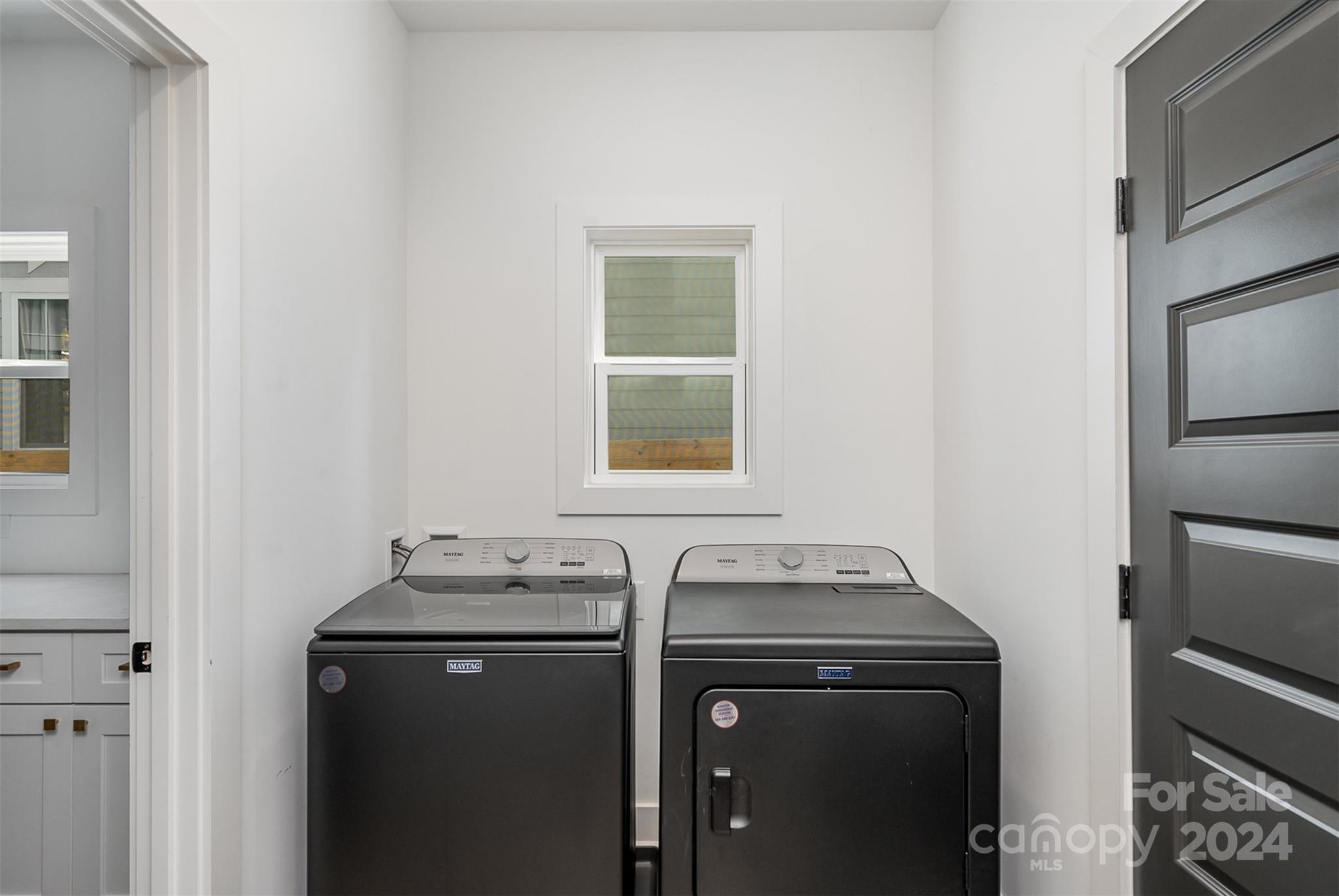 643 Tennyson Drive Charlotte, NC 28208 - Photo 26 of 42 a utility room with dryer and washer