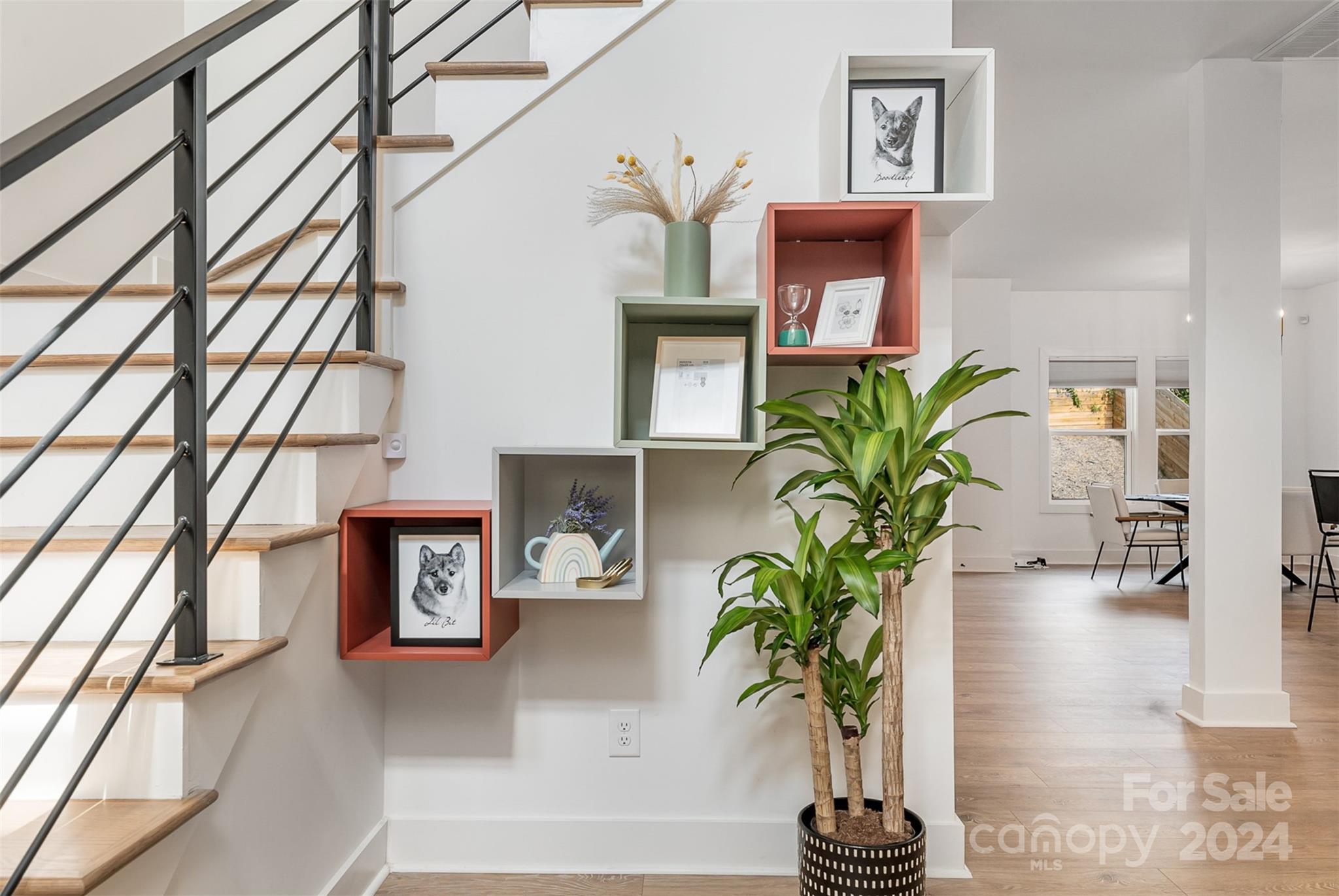 643 Tennyson Drive Charlotte, NC 28208 - Photo 35 of 42 a view of living room with furniture and a potted plant