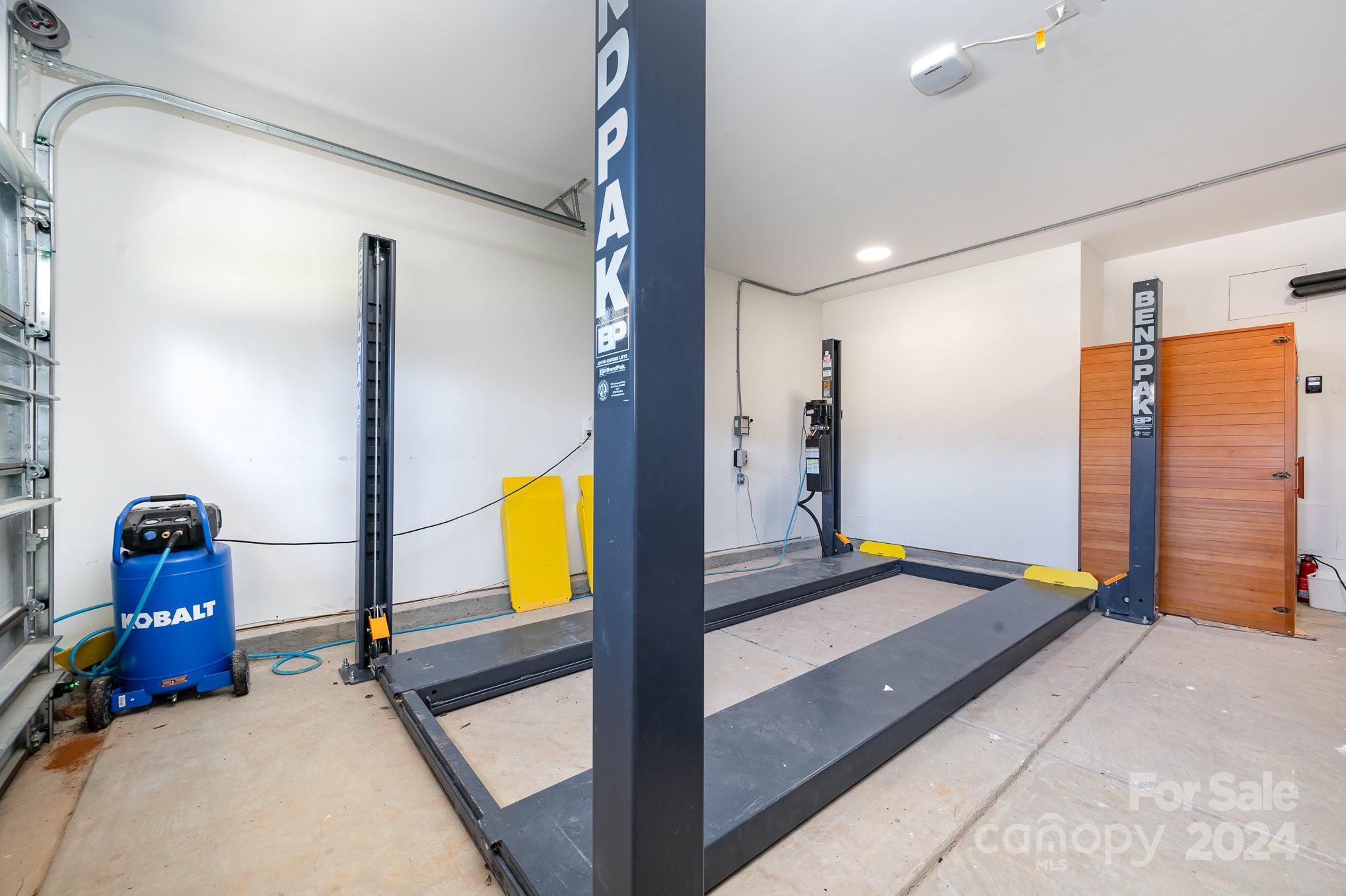 643 Tennyson Drive Charlotte, NC 28208 - Photo 38 of 42 a bedroom with bed and window