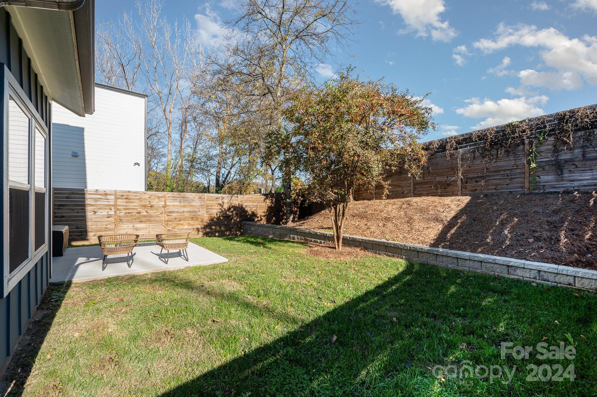 643 Tennyson Drive Charlotte, NC 28208 - Photo 40 of 42 a view of yard with patio