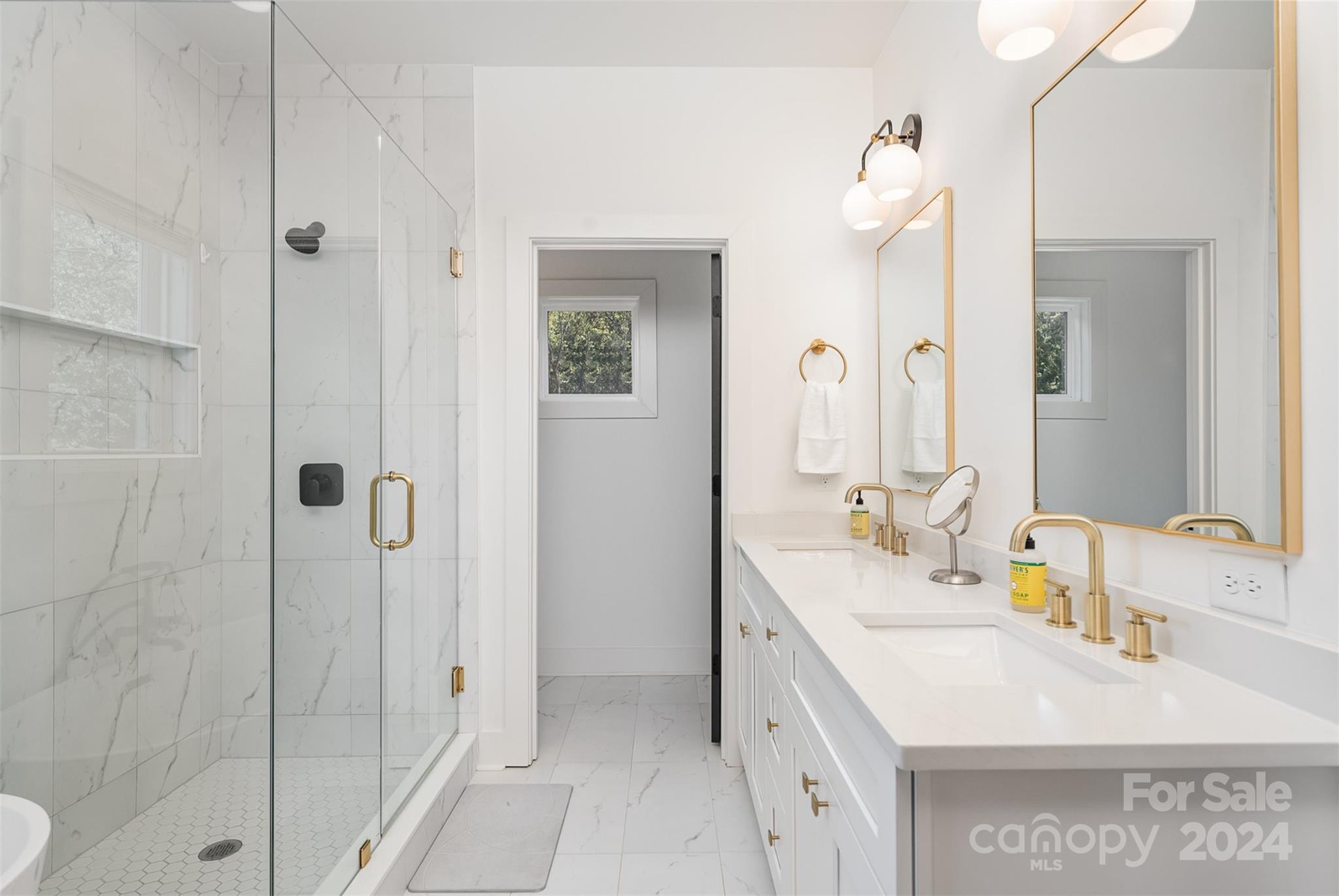643 Tennyson Drive Charlotte, NC 28208 - Photo 10 of 42 a bathroom with a double vanity sink mirror and shower