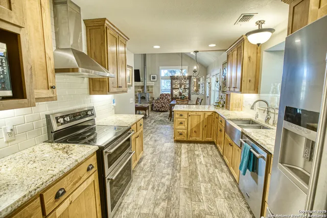 a bedroom with a bed window and a dresser