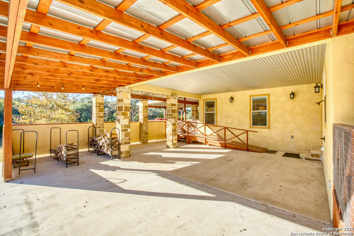255 North Thunder Creek Road Utopia, TX 78884 - Photo 29 of 46 a view of a patio with a patio