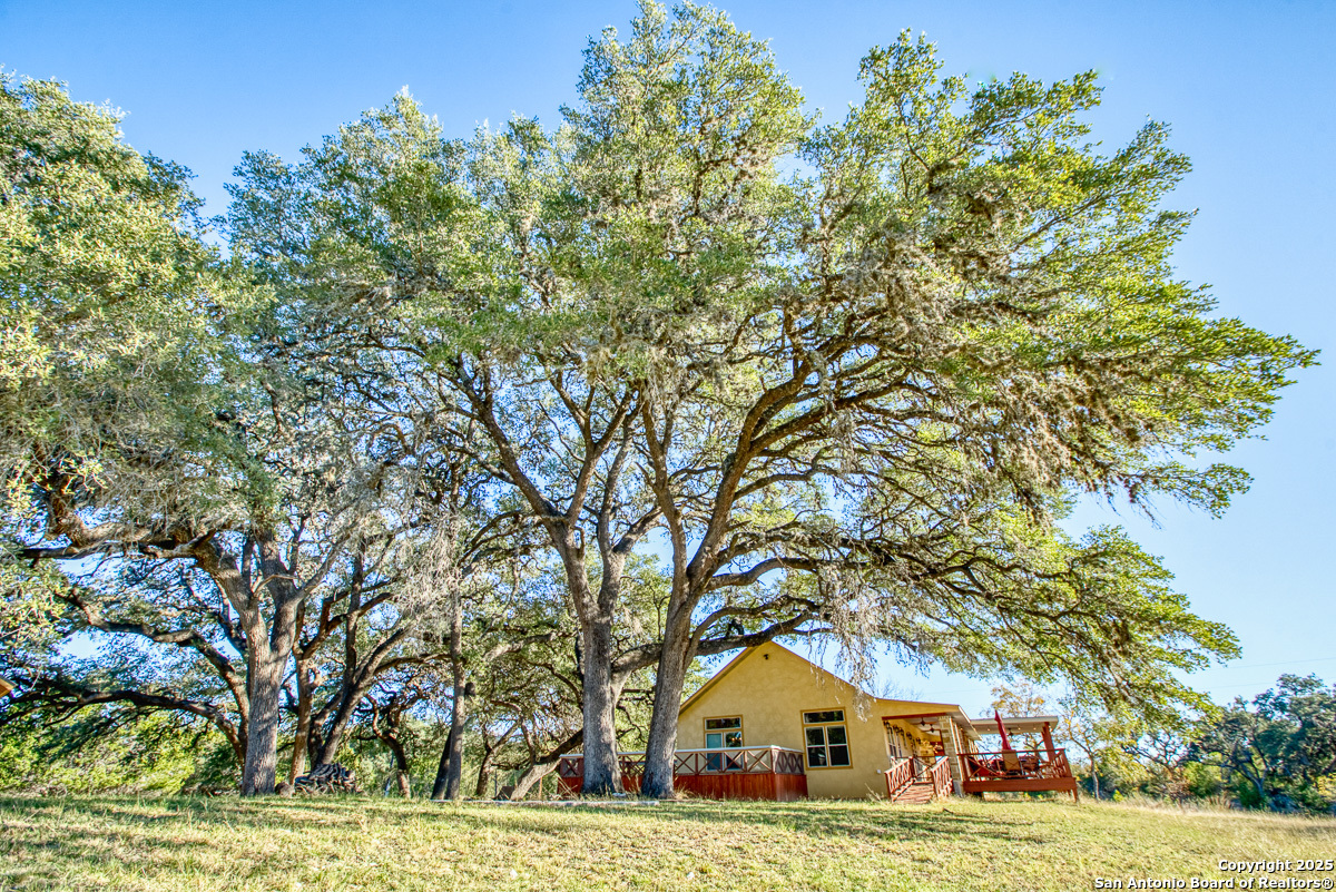 255 North Thunder Creek Road Utopia, TX 78884 - Photo 31 of 46 a view of swimming pool with an outdoor space