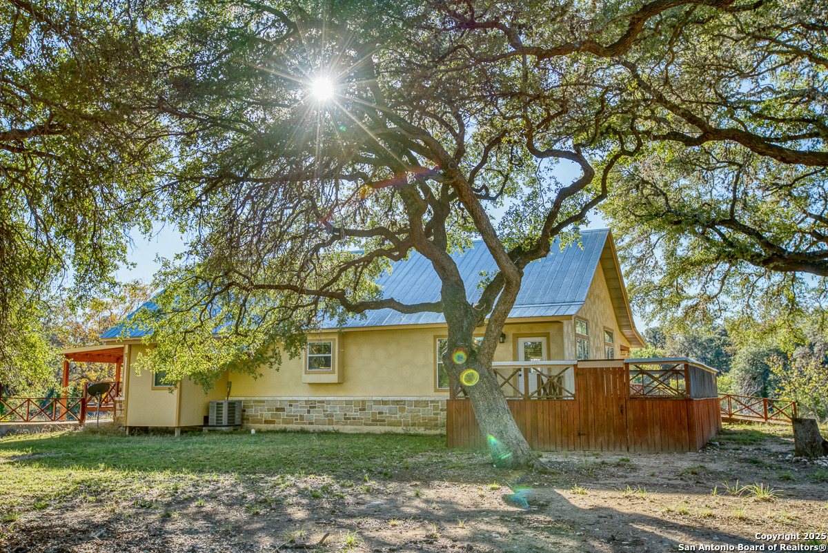 255 North Thunder Creek Road Utopia, TX 78884 - Photo 35 of 46 a view of a large trees with a big yard