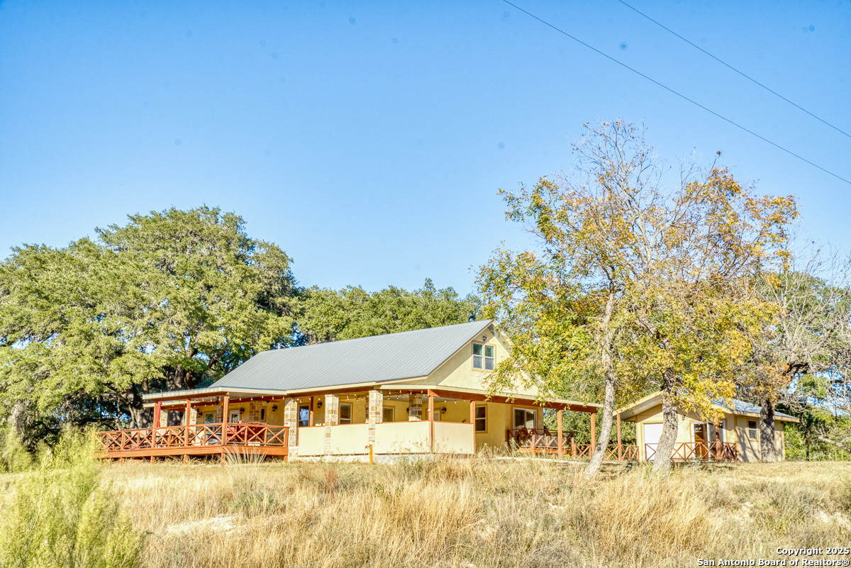 255 North Thunder Creek Road Utopia, TX 78884 - Photo 41 of 46 a view of house with outdoor space