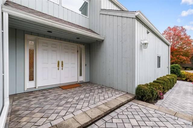 a view of a front door and a window