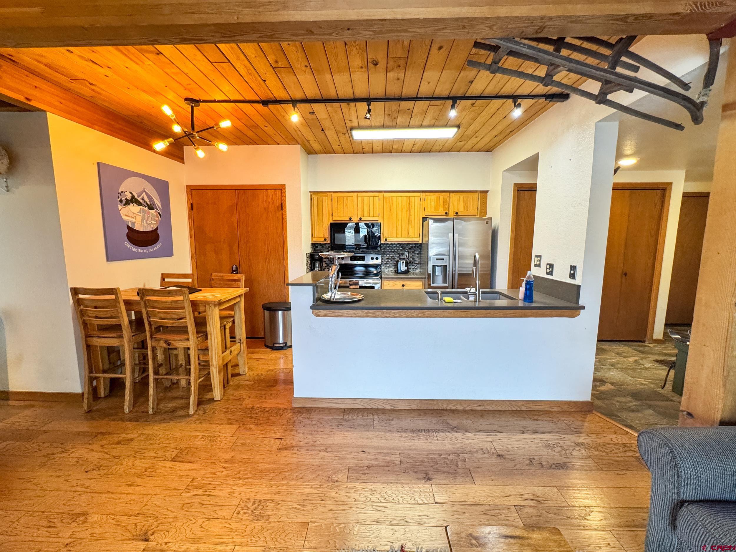 400 Gothic Road, Unit 305 Crested Butte, CO 81225 - Photo 13 of 38 a view of a swimming pool with outdoor seating