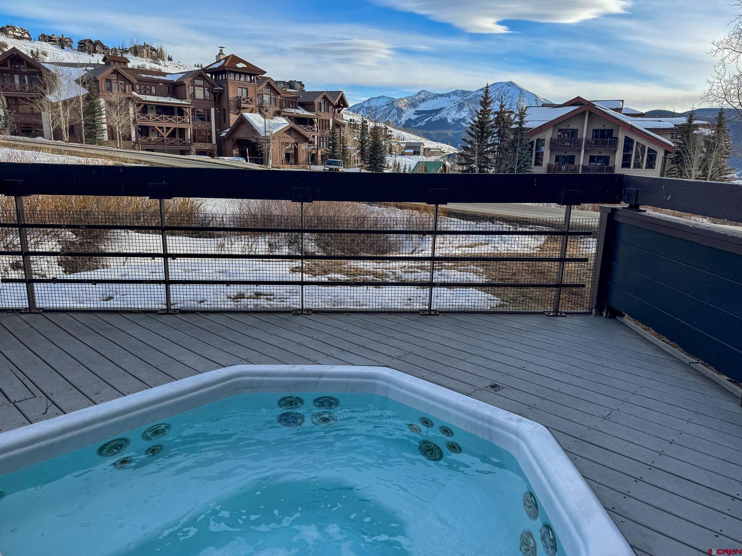 400 Gothic Road, Unit 305 Crested Butte, CO 81225 - Photo 32 of 38 a view of a balcony with two chairs