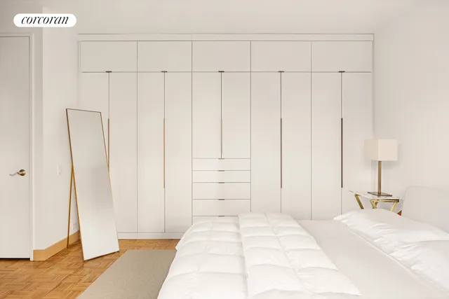 a spacious bedroom with a large bed and a large window