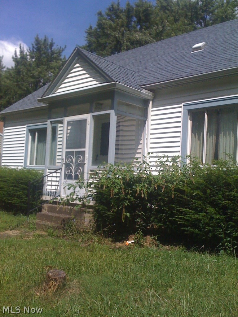 1057 Inman Street Akron, OH 44306 - Photo 1 of 13 This Cape Cod style home is on an extra large corner lot. (2 parcels)