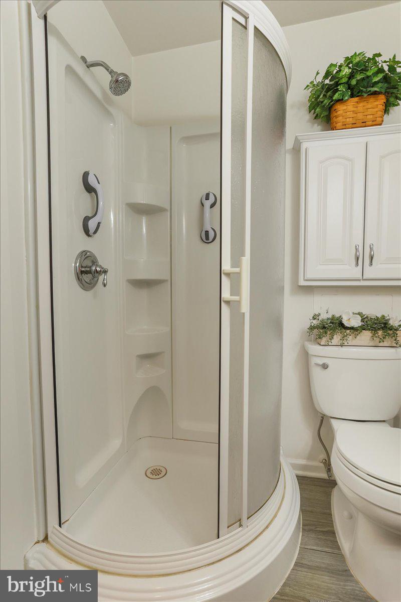 16040 Cloverton Lane Williamsport, MD 21795 - Photo 22 of 35 a bathroom with a shower a toilet and a sink