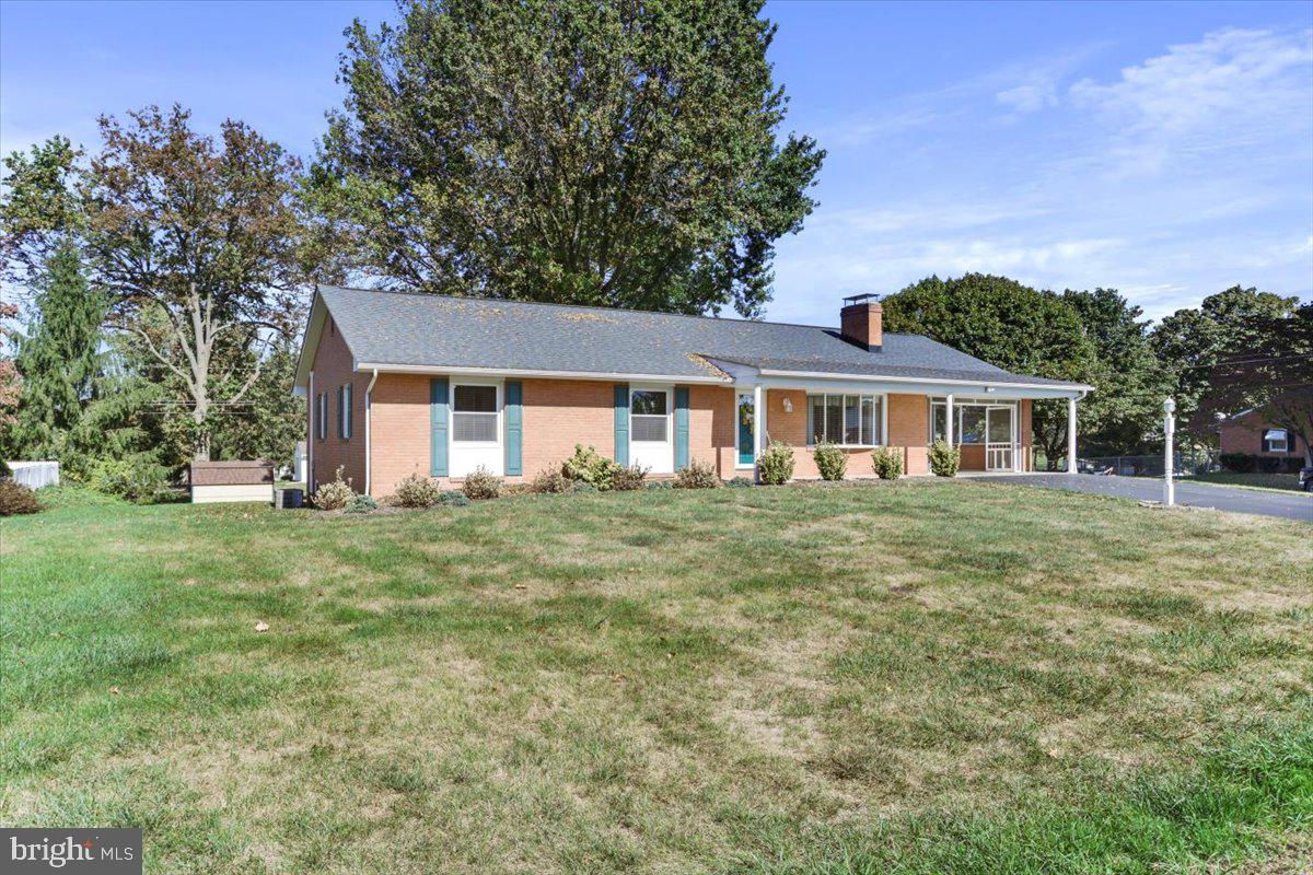16040 Cloverton Lane Williamsport, MD 21795 - Photo 35 of 35 a front view of a house with a garden