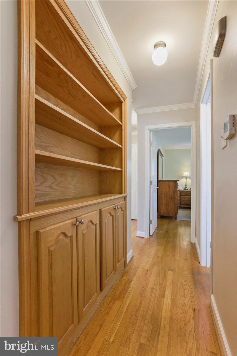 16040 Cloverton Lane Williamsport, MD 21795 - Photo 10 of 35 a view of a hallway with wooden floor and a bathroom