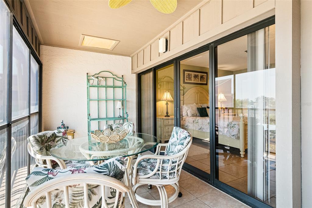 3160 Matecumbe Key Road, Unit 233 Punta Gorda, FL 33955 - Photo 19 of 33 a view of a dining room with furniture window and outside view
