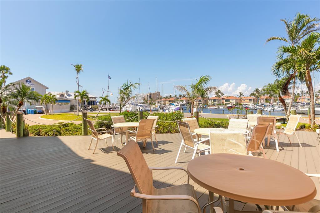 3160 Matecumbe Key Road, Unit 233 Punta Gorda, FL 33955 - Photo 3 of 33 a view of a swimming pool with outdoor seating