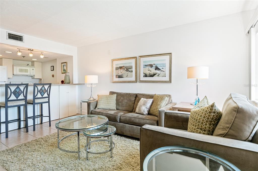 3160 Matecumbe Key Road, Unit 233 Punta Gorda, FL 33955 - Photo 7 of 33 a living room with furniture and a table