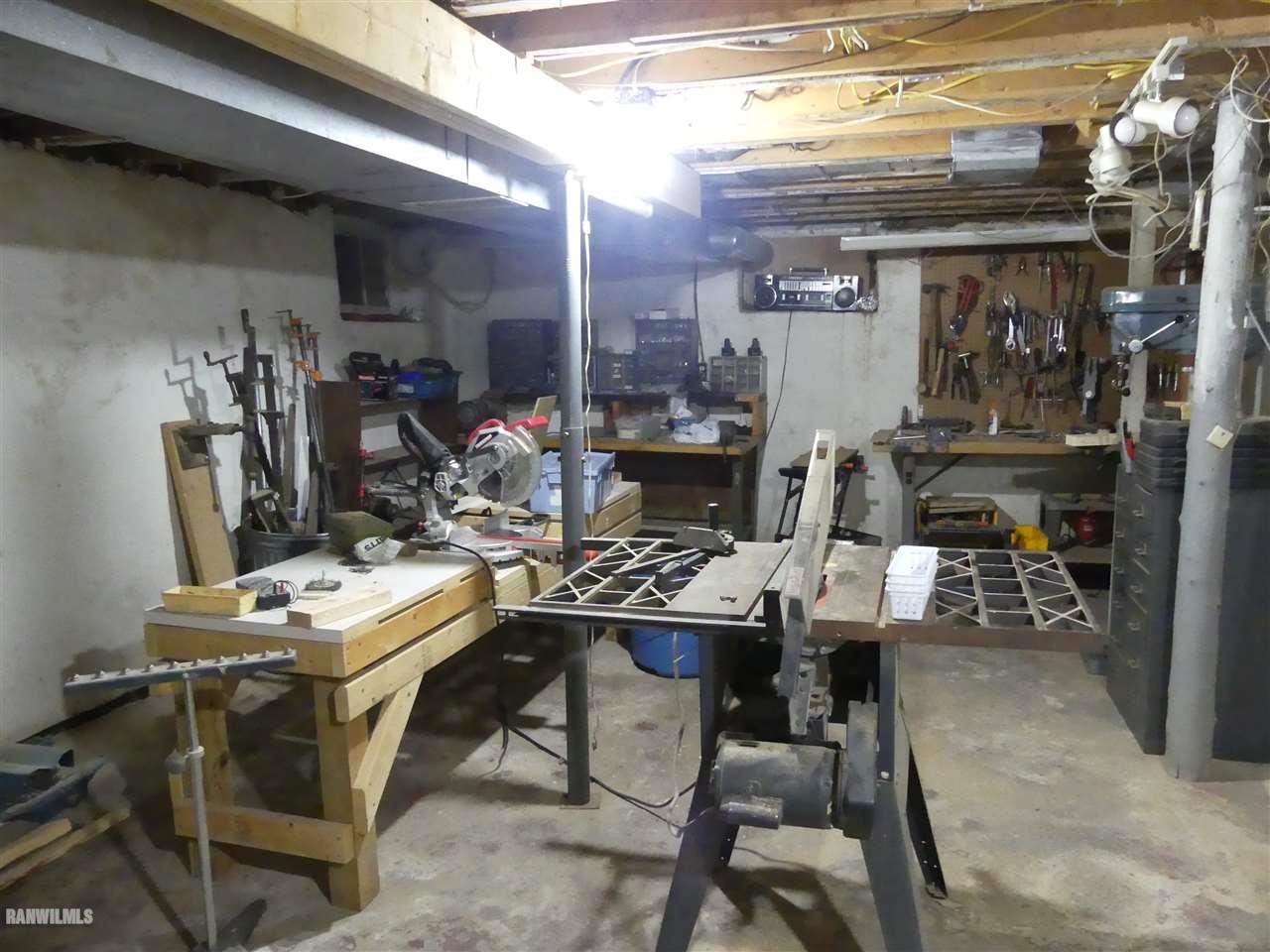 2692 North AYP Road Freeport, IL 61032 - Photo 57 of 67 a view of a room with workspace and toys