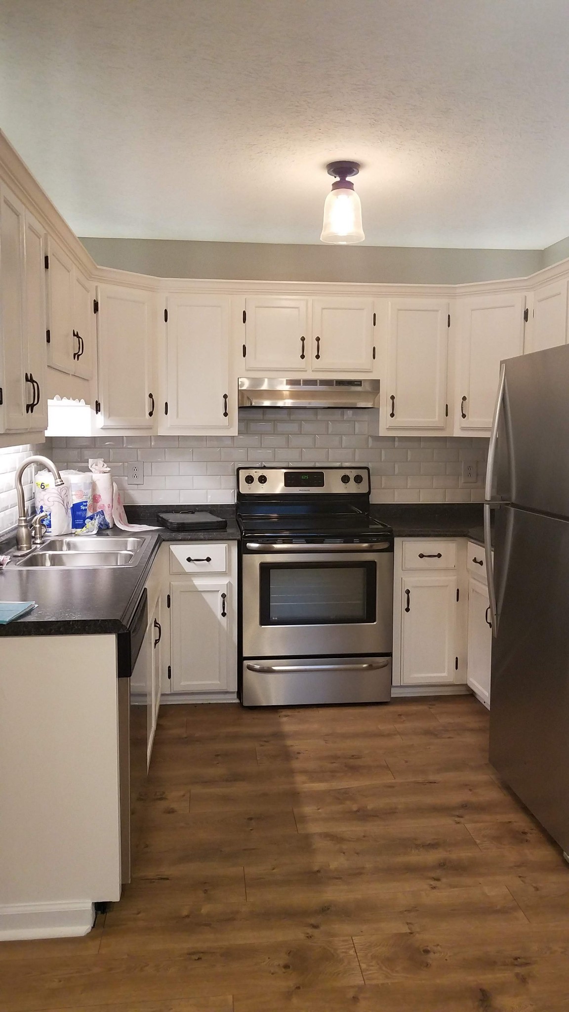 3784 Dot Road Springfield, TN 37172 - Photo 1 of 8 a kitchen with a stove and a refrigerator