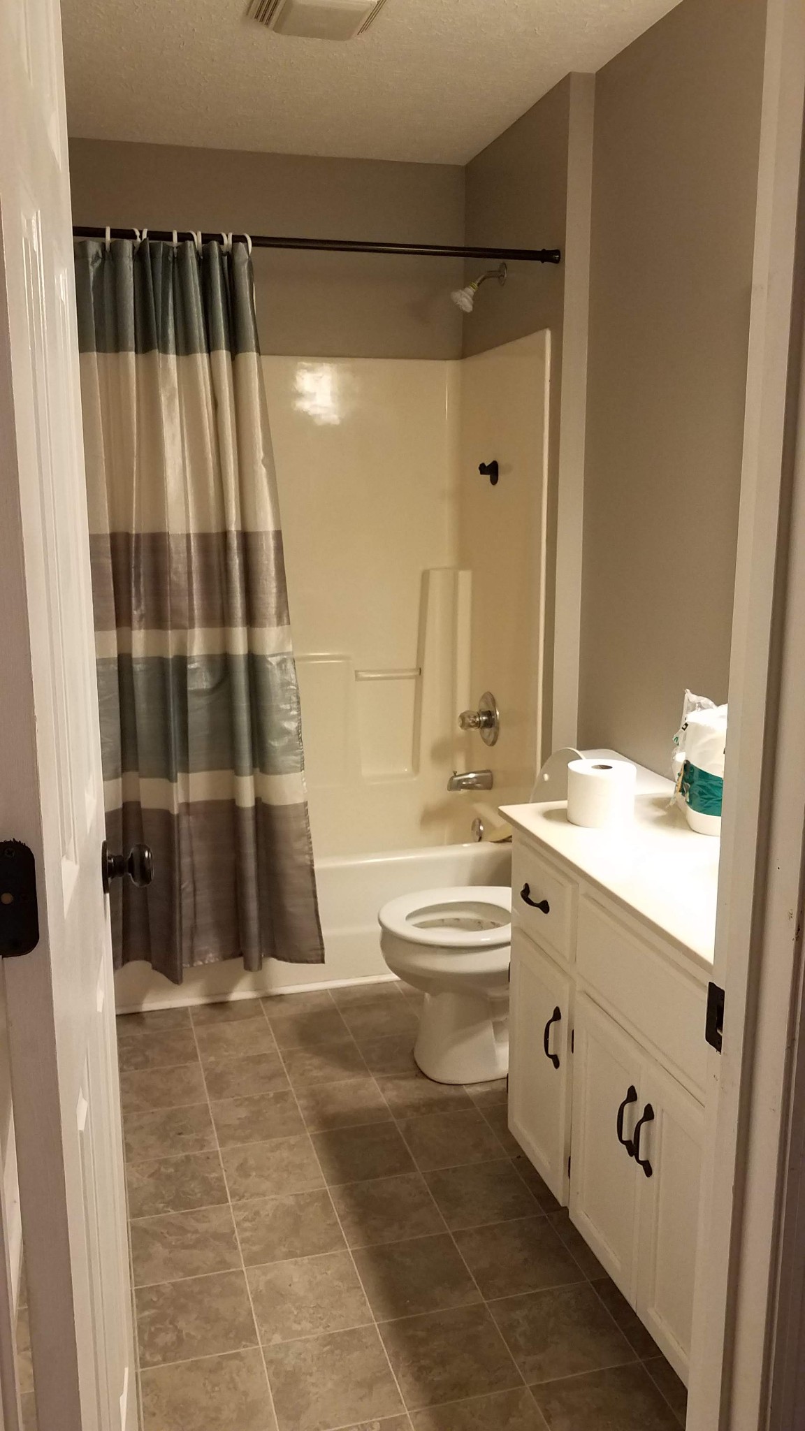3784 Dot Road Springfield, TN 37172 - Photo 7 of 8 a bathroom with a sink and mirror with bathtub
