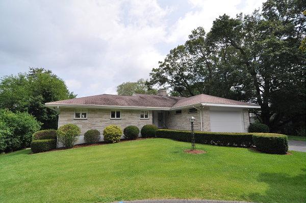 15 Parker Road Arlington, MA 02474 - Photo 1 of 19 a view of a house with a yard and a garden