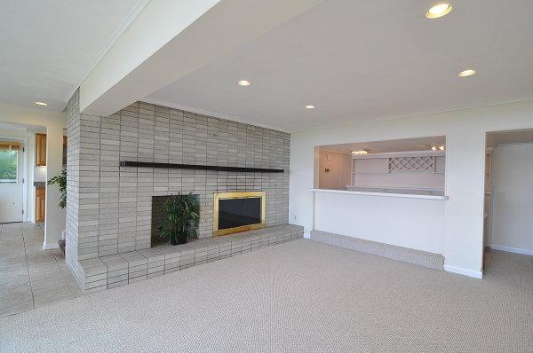 15 Parker Road Arlington, MA 02474 - Photo 11 of 19 an empty room with fireplace and windows