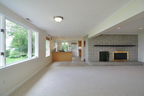 15 Parker Road Arlington, MA 02474 - Photo 12 of 19 a view of an empty room with a fireplace