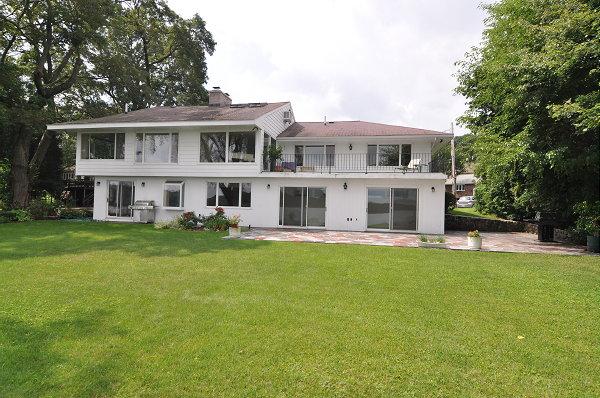 15 Parker Road Arlington, MA 02474 - Photo 17 of 19 a front view of a house with a garden