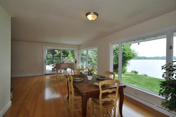 15 Parker Road Arlington, MA 02474 - Photo 4 of 19 a view of a dining room with furniture window and wooden floor