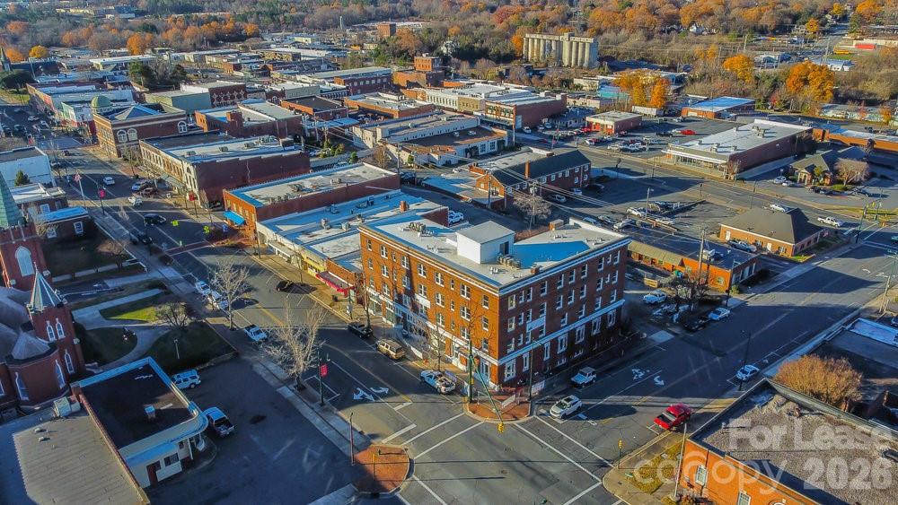 197 North 2nd Street, Unit 3 Albemarle, NC 28001 - Photo 18 of 19 an aerial view of a building with outdoor space