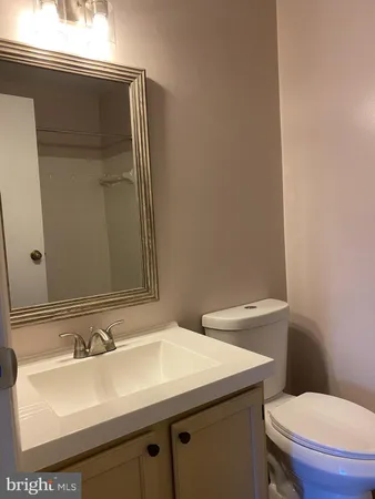 a bathroom with a sink and a toilet