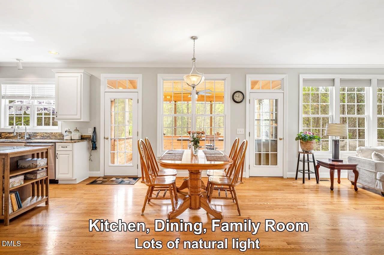 265 Old Chestnut Crossing Moncure, NC 27559 - Photo 11 of 45 a view of a dining room with furniture window and outside view