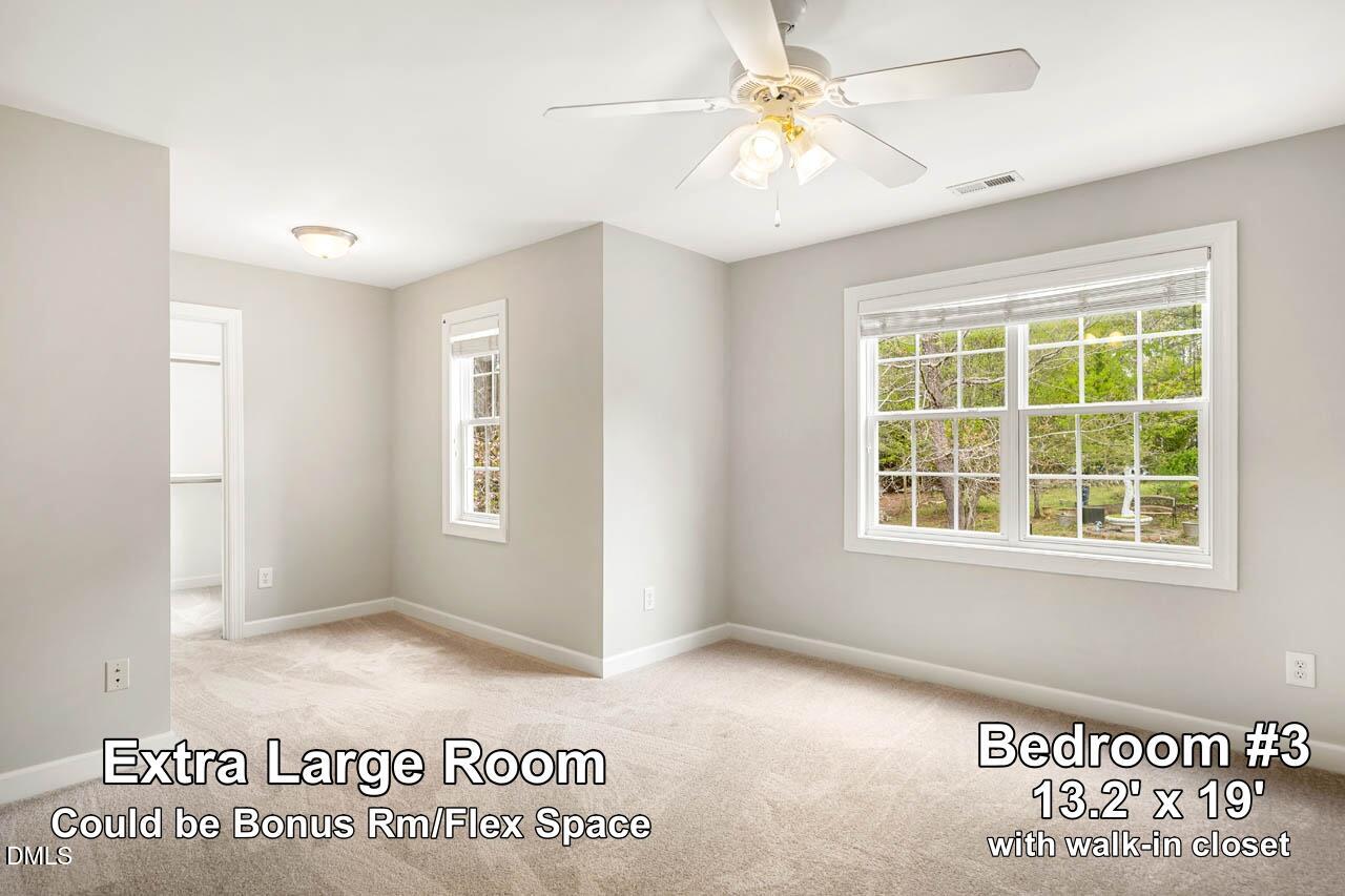 265 Old Chestnut Crossing Moncure, NC 27559 - Photo 27 of 45 an empty room with windows and fan