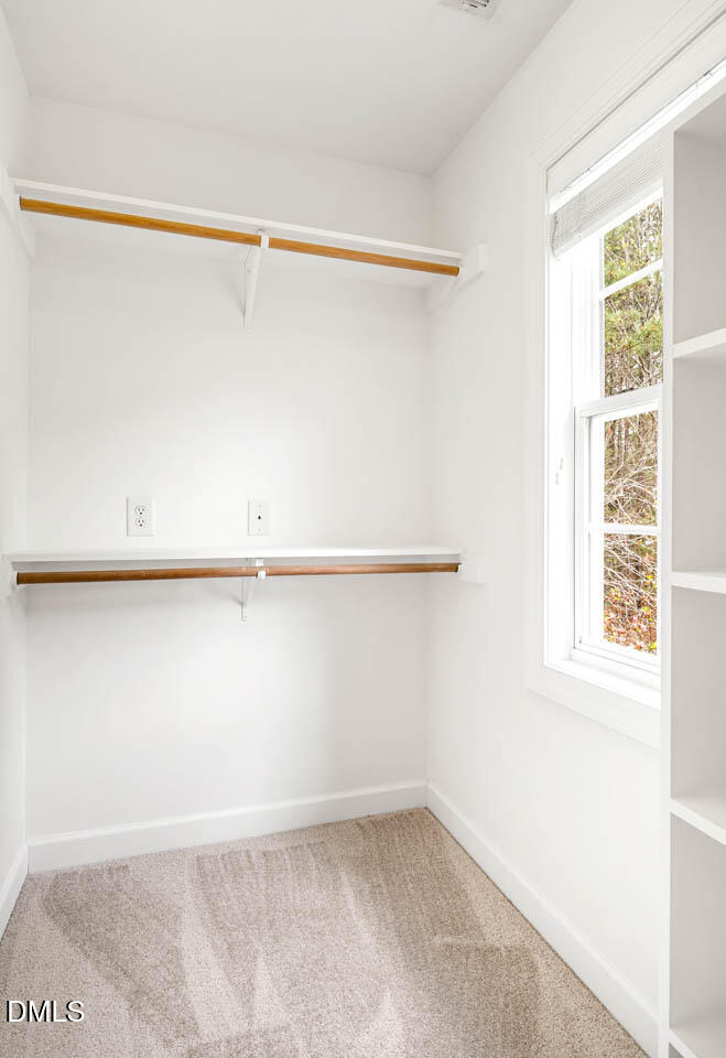 265 Old Chestnut Crossing Moncure, NC 27559 - Photo 28 of 45 a view of small space with racks on the wall