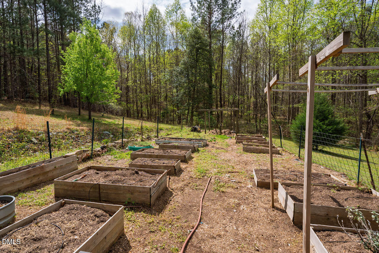 265 Old Chestnut Crossing Moncure, NC 27559 - Photo 37 of 45 a view of a backyard with sitting area