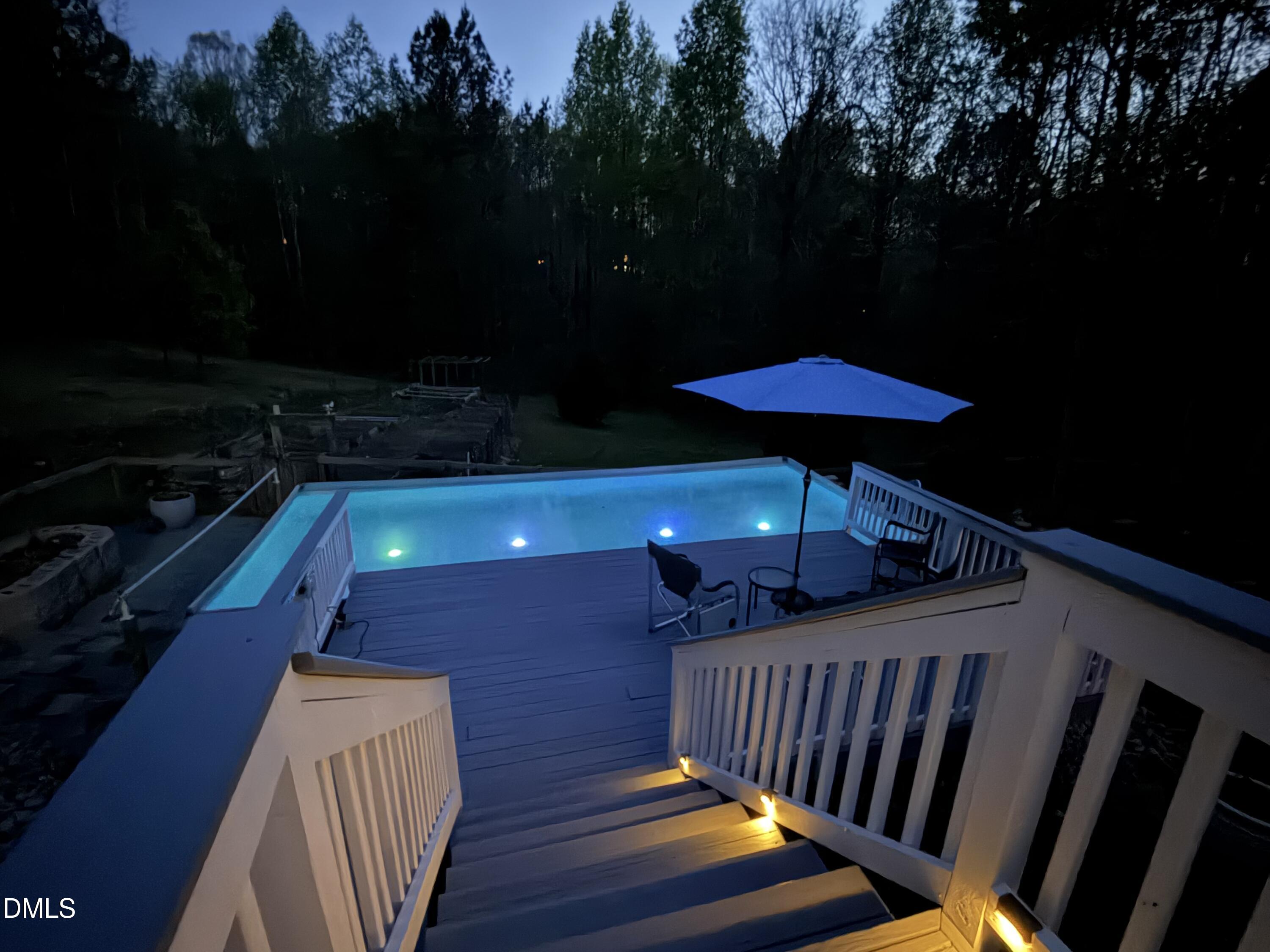 265 Old Chestnut Crossing Moncure, NC 27559 - Photo 41 of 45 a view of balcony with furniture and umbrella