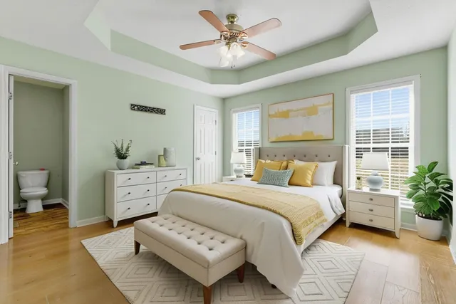 a bedroom with a bed and furniture