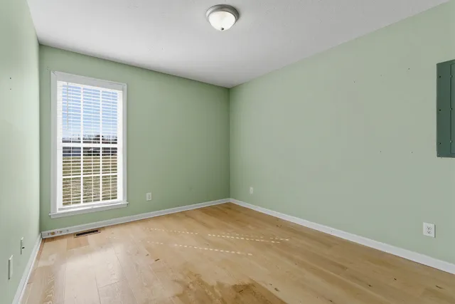 an empty room with windows
